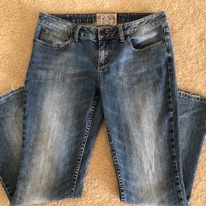 American Rag Boot Cut Washed Jeans.